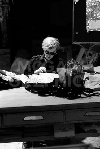 Andy at Typewriter, The Factory, NYC, circa 1965 -  Andy Warhol/ Nat Finkelstein - McGaw Graphics